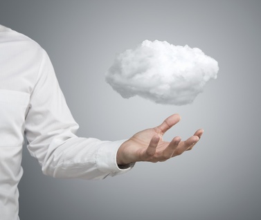 man holding cloud of data