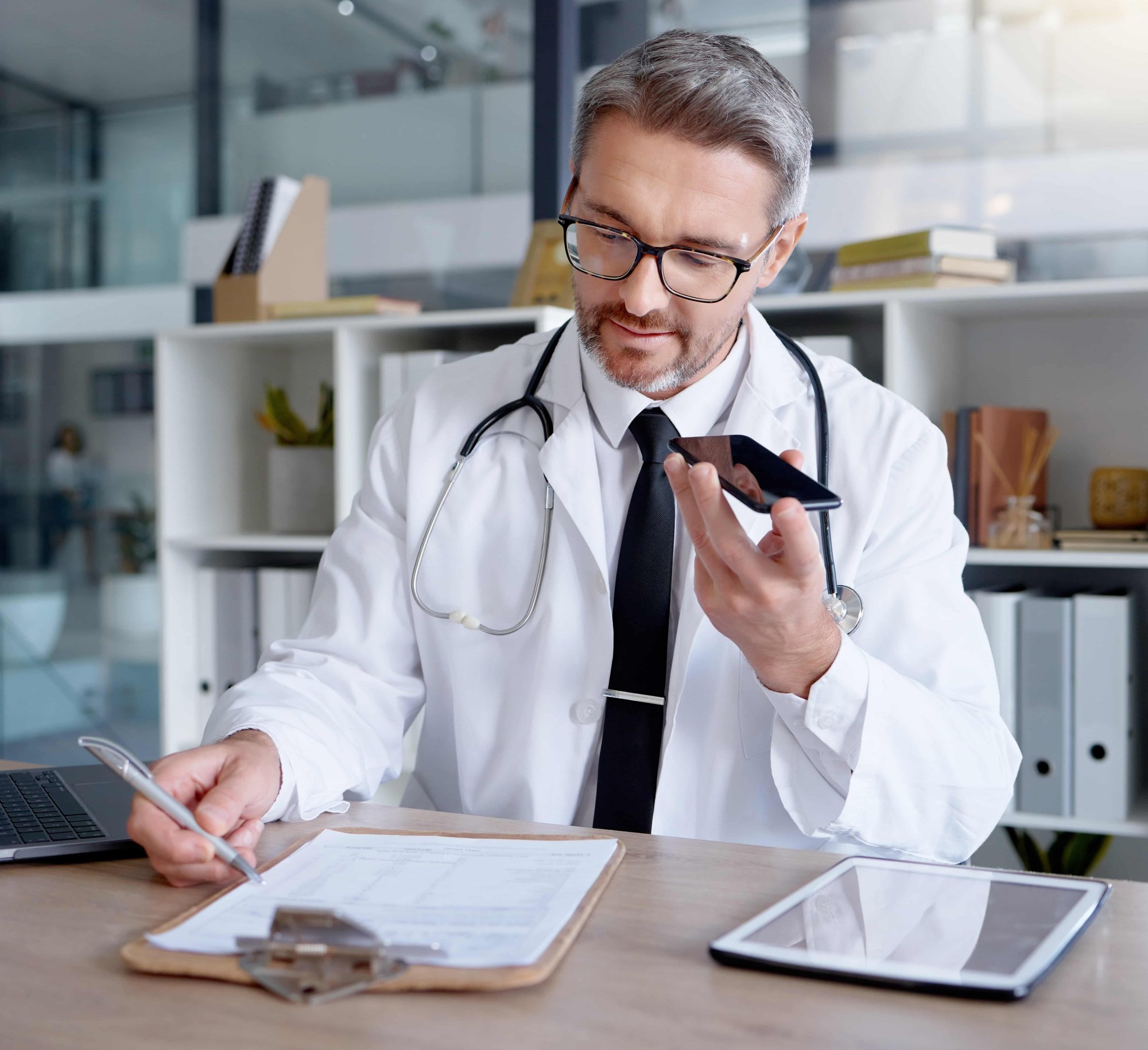 phone call or hospital clipboard in telehealth consulting_569110410