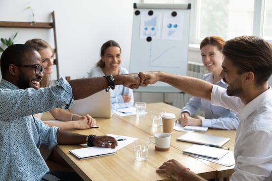 team-meeting-fist-bumping-1