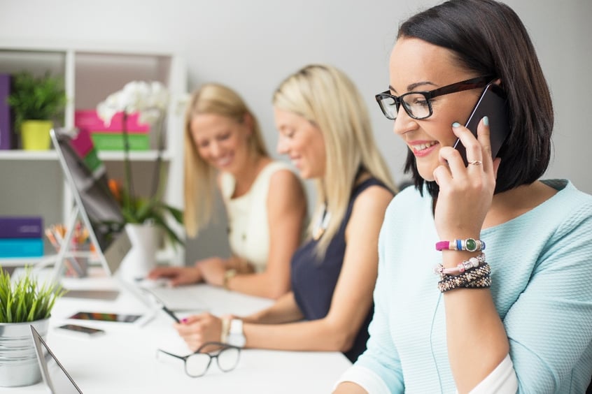 team-smiling-talking-on-phone-1
